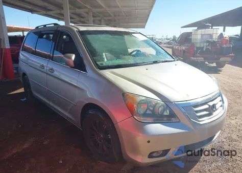 2009 Honda Odyssey Touring z USA, uszkodzony, nr VIN 5FNRL38819B021352